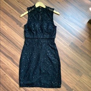 Sequined black lace cocktail dress
